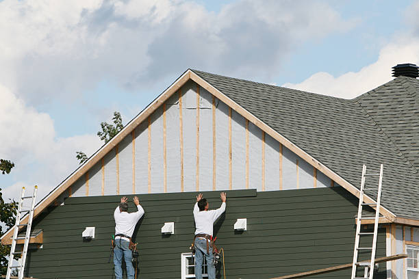 Professional Siding technician working in Dysart, PA